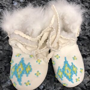 Genuine leather hand beaded Sherpa lined moccasins